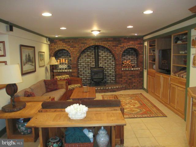 9505 Buckhorn Road Baltimore, MD 21234 - Photo 20 of 30 Family Room with Wood Burning Stove