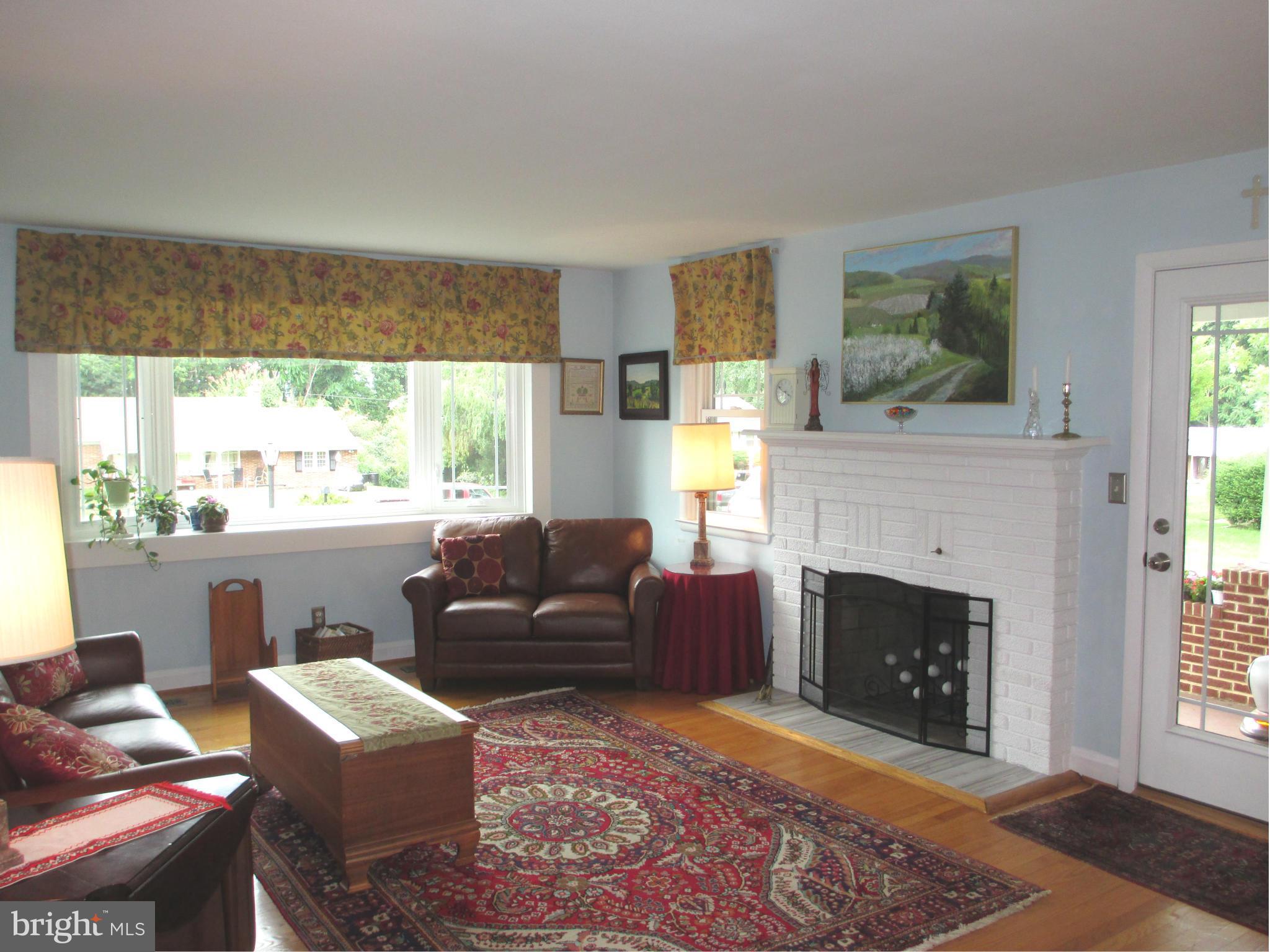 9505 Buckhorn Road Baltimore, MD 21234 - Photo 6 of 30 Living Room with Wood Burning Fireplace