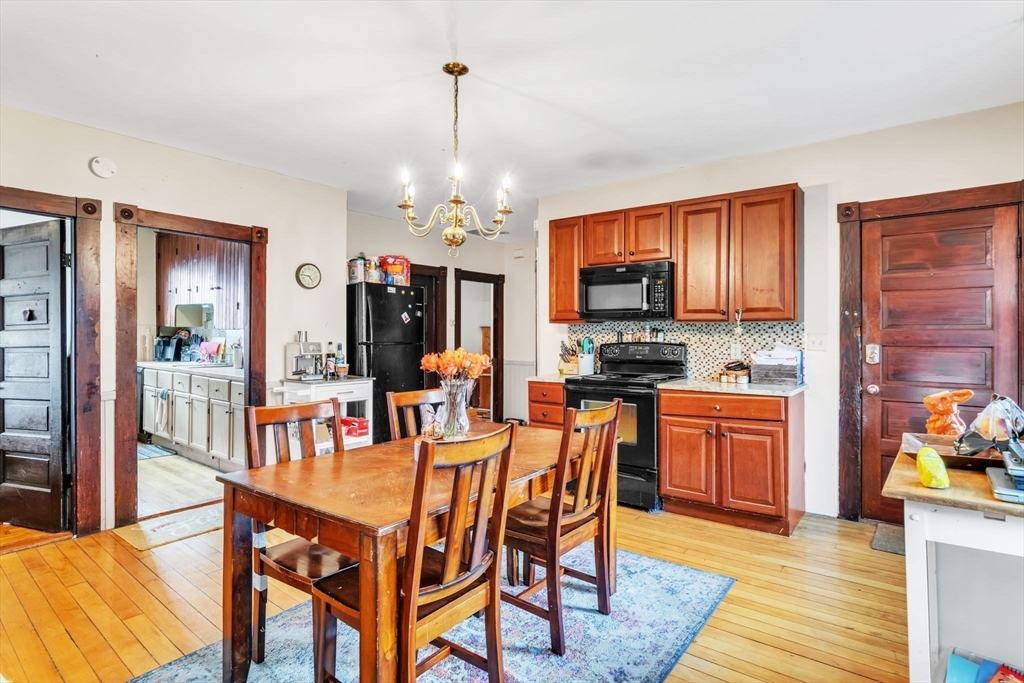 47 Harold Street North Andover, MA 01845 - Photo 11 of 38 a view of a dining room with furniture window and wooden floor