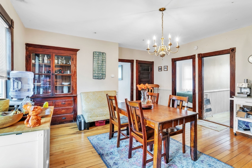 47 Harold Street North Andover, MA 01845 - Photo 12 of 38 a view of a dining room with furniture window and wooden floor