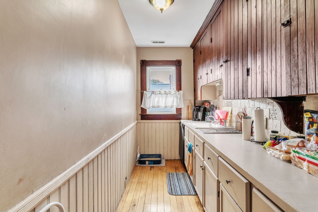 47 Harold Street North Andover, MA 01845 - Photo 15 of 38 a kitchen with a sink and cabinets