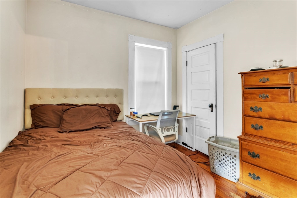47 Harold Street North Andover, MA 01845 - Photo 19 of 38 a bedroom with a bed and a dresser