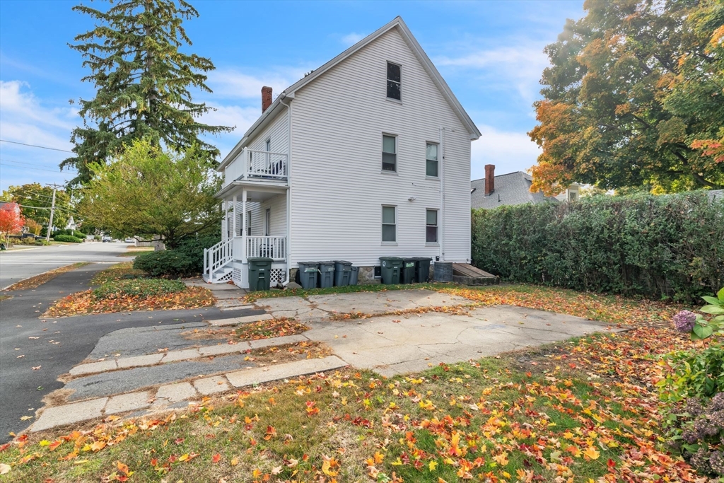 47 Harold Street North Andover, MA 01845 - Photo 29 of 38 a view of a house with a yard and garage
