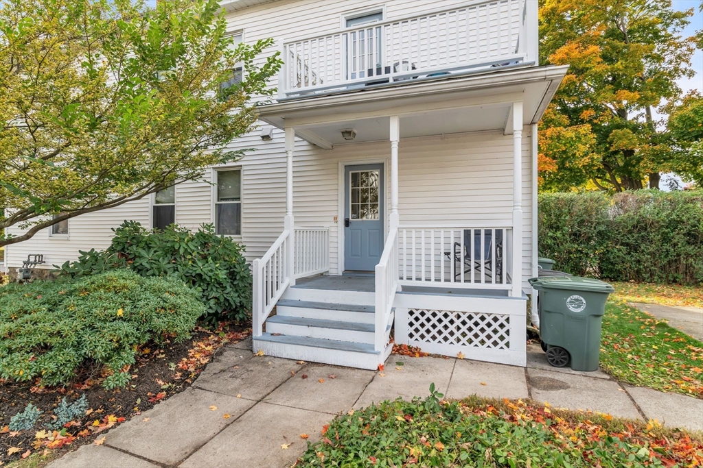 47 Harold Street North Andover, MA 01845 - Photo 30 of 38 a view of a patio with table and chairs and potted plants