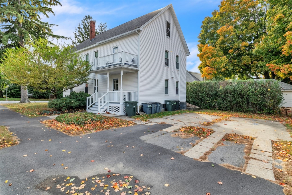 47 Harold Street North Andover, MA 01845 - Photo 35 of 38 a front view of a house with a yard