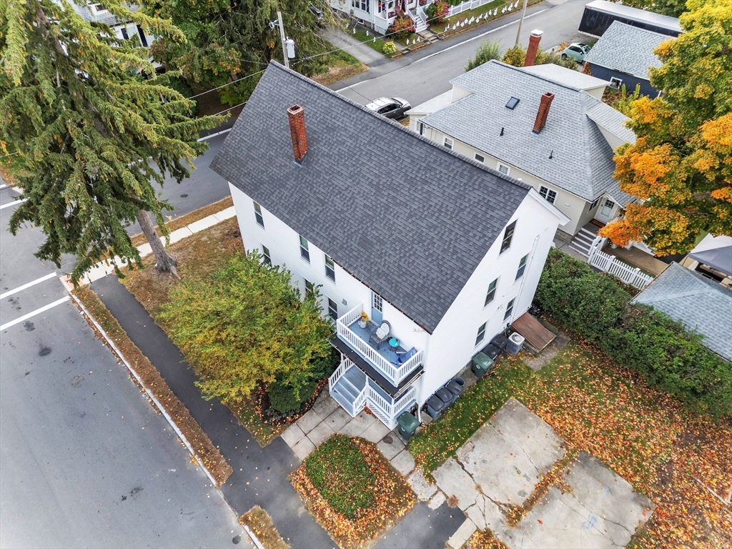 47 Harold Street North Andover, MA 01845 - Photo 37 of 38 an aerial view of a house with a yard