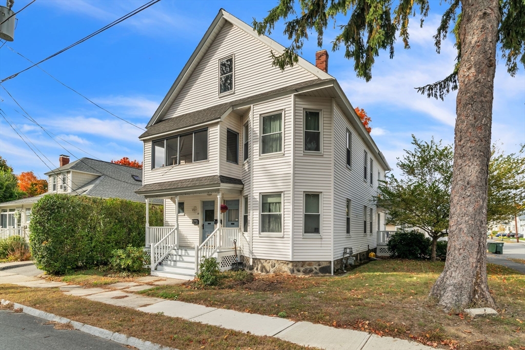 47 Harold Street North Andover, MA 01845 - Photo 4 of 38 a front view of a house with a yard