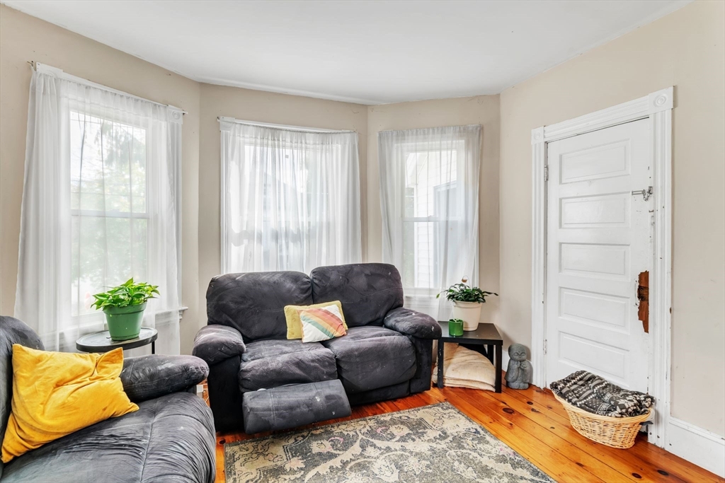 47 Harold Street North Andover, MA 01845 - Photo 7 of 38 a living room with furniture and a window