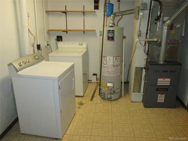 a bathroom with a sink and mirror with toilet