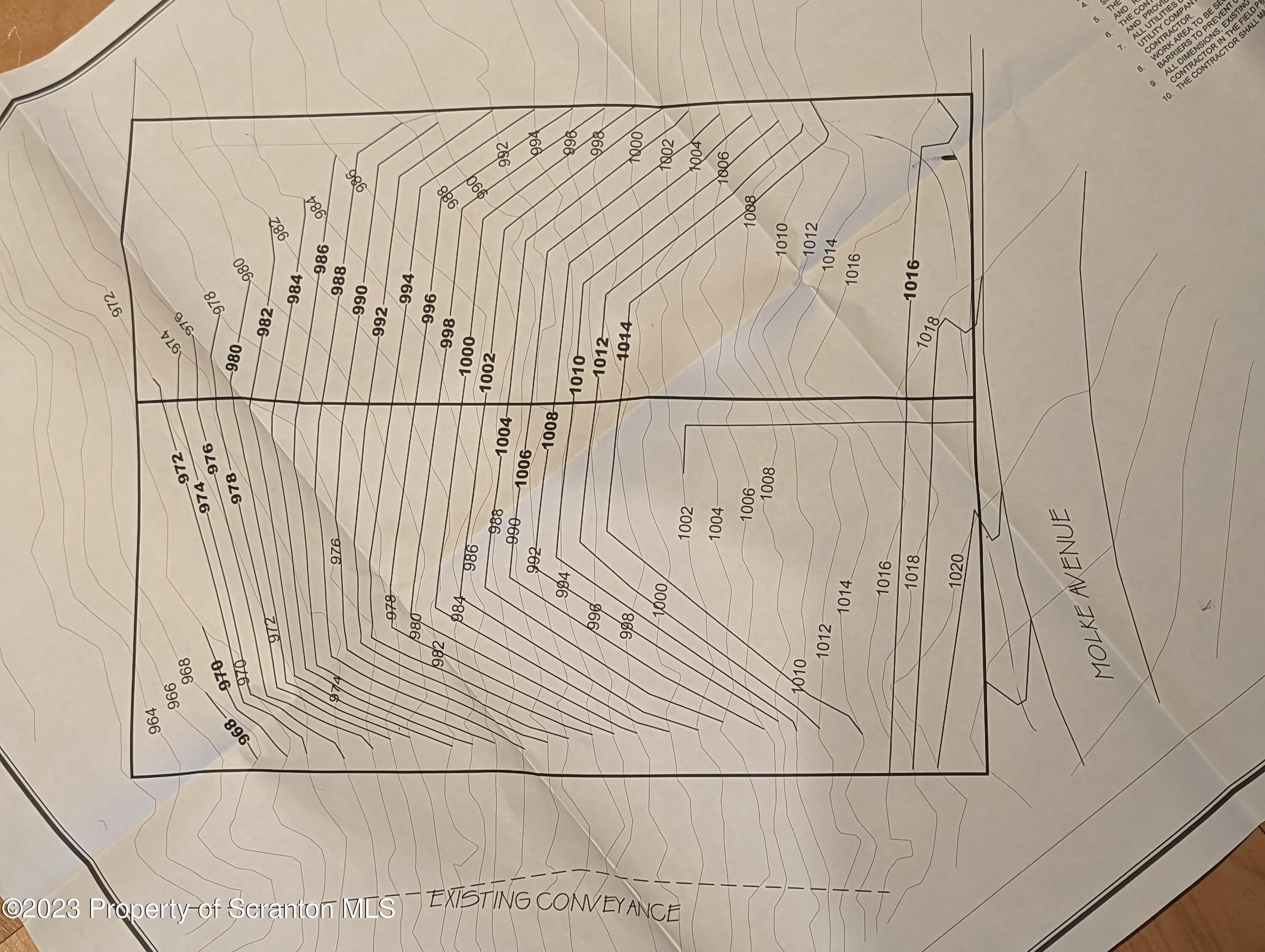 Brook Street Scranton, PA 18505 - Photo 8 of 9 a view of a bathroom with white wall and a shower