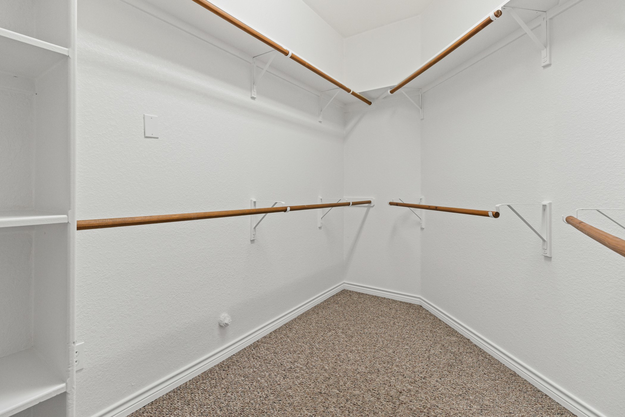 715 Enchanted Rock Trail Georgetown, TX 78633 - Photo 15 of 24 Spacious primary walk in closet. The only carpet in the home.