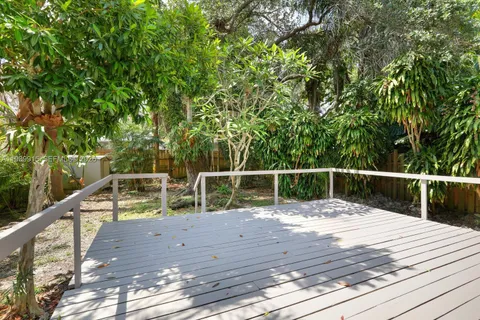 a view of house with swimming pool