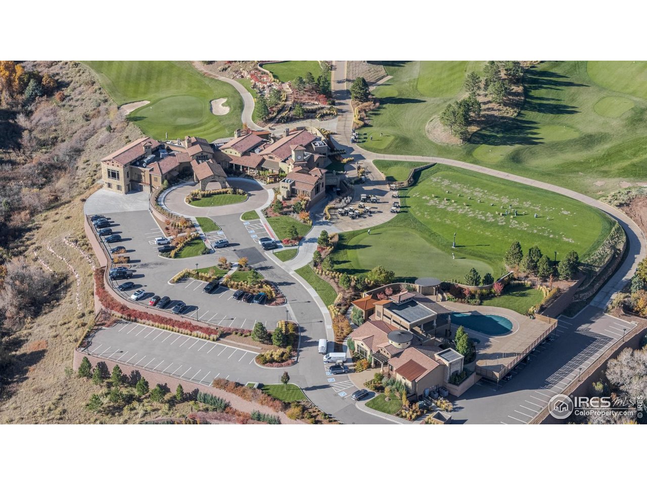 7572 Raphael Lane Littleton, CO 80125 - Photo 50 of 50 Join the Golf Club at Ravenna and experience the stately Clubhouse-where neighbors become friends, days unfold by the pool or cabana, and evenings bring fine dining, live music, and fireside gatherings beneath the stars.
