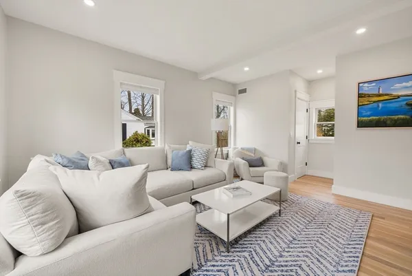 a living room with furniture and a couch
