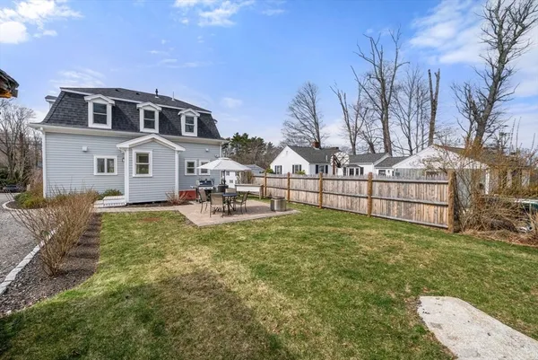 a view of backyard with green space