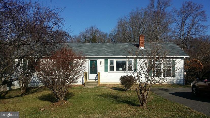 205 Berea Church Road Fredericksburg, VA 22406 - Photo 1 of 23 a front view of a house with garden