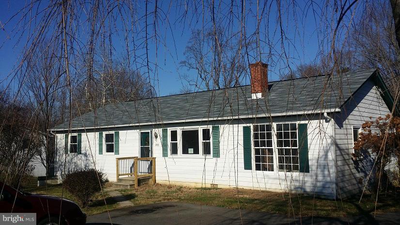 205 Berea Church Road Fredericksburg, VA 22406 - Photo 2 of 23 a front view of a house with a yard