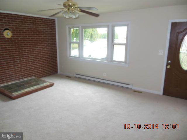 205 Berea Church Road Fredericksburg, VA 22406 - Photo 15 of 23 a view of a livingroom with an empty space and a window