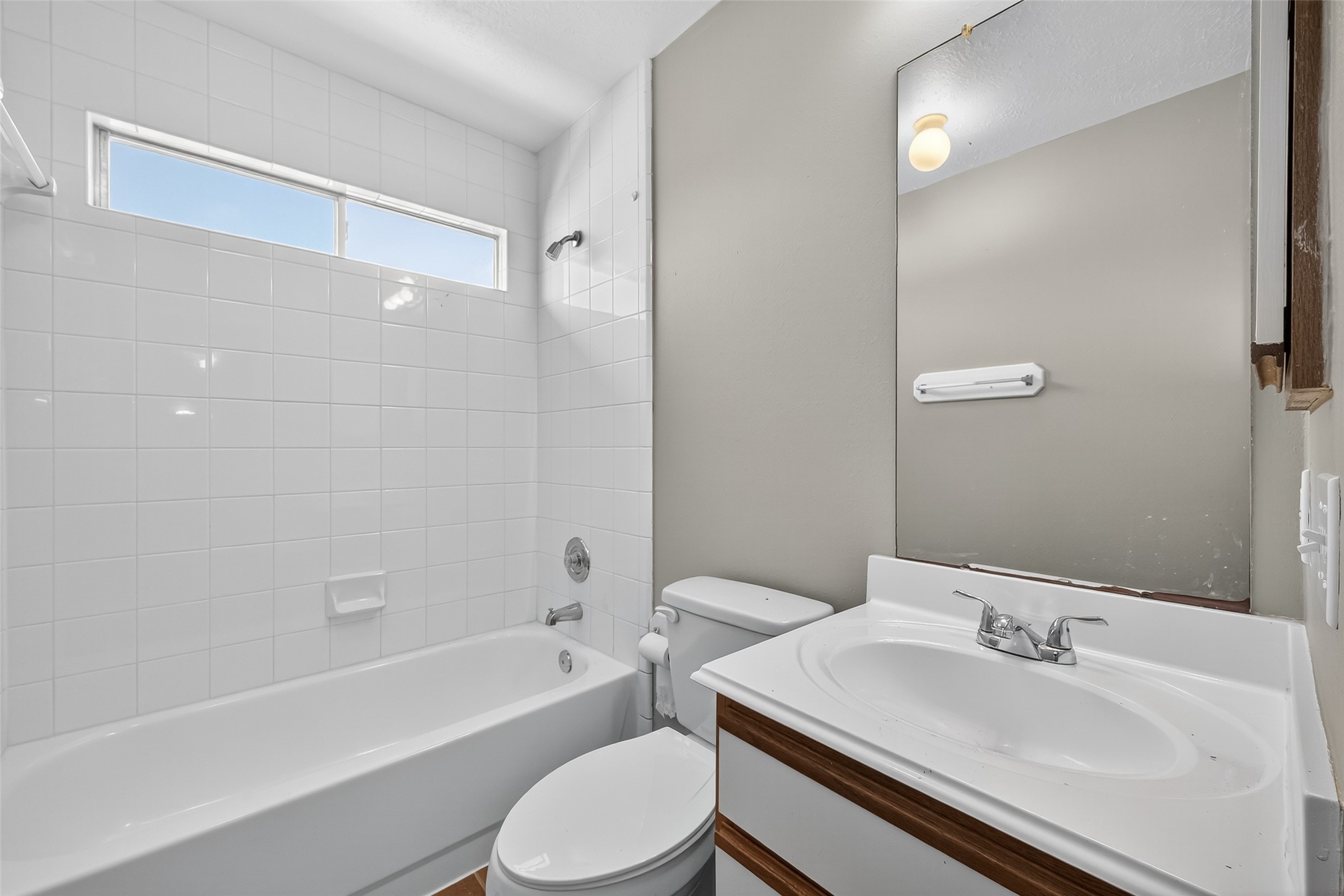 1107 Pennygent Lane Channelview, TX 77530 - Photo 23 of 40 a bathroom with a sink toilet and shower