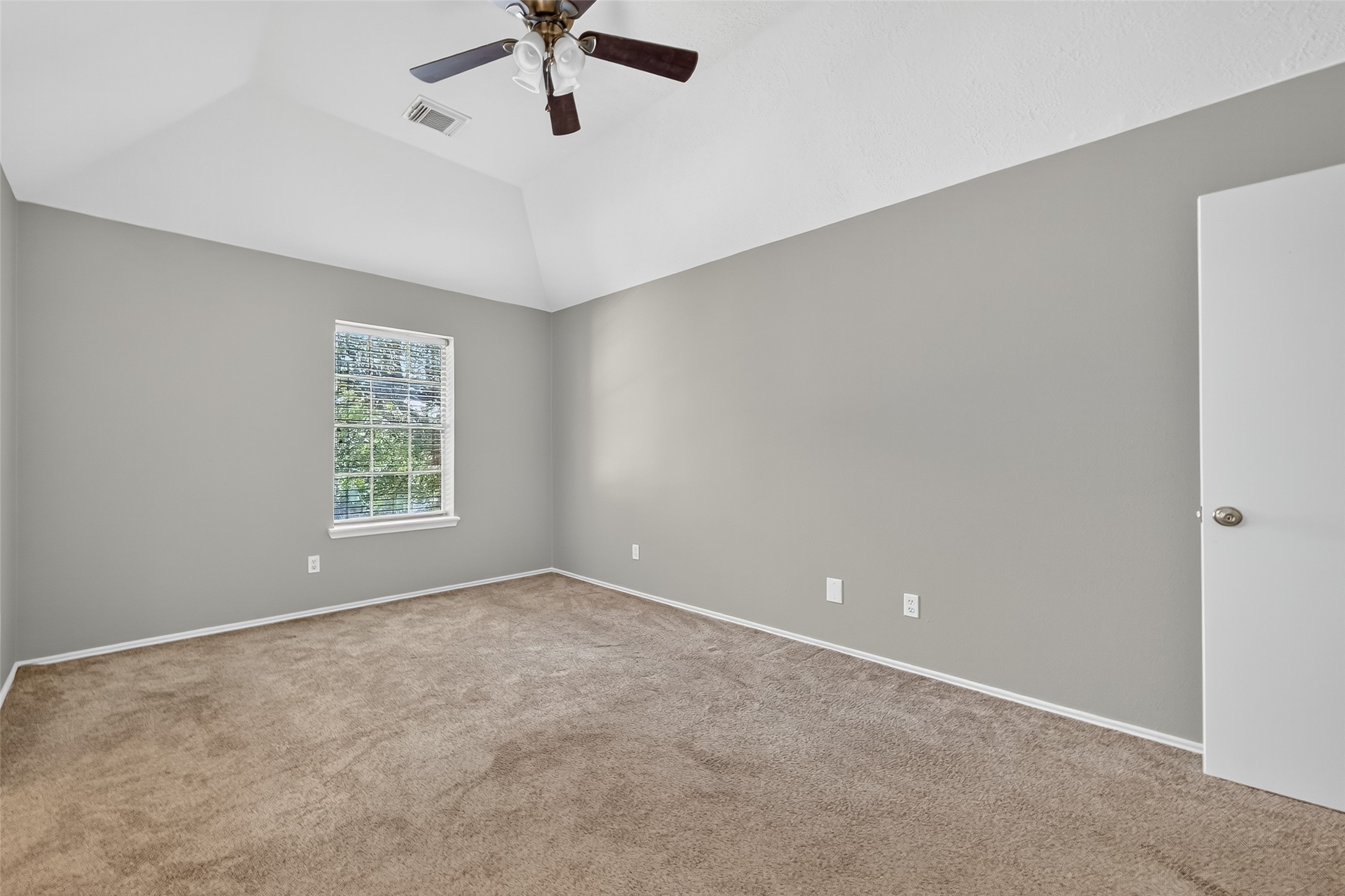 1107 Pennygent Lane Channelview, TX 77530 - Photo 28 of 40 an empty room with a window and a fan