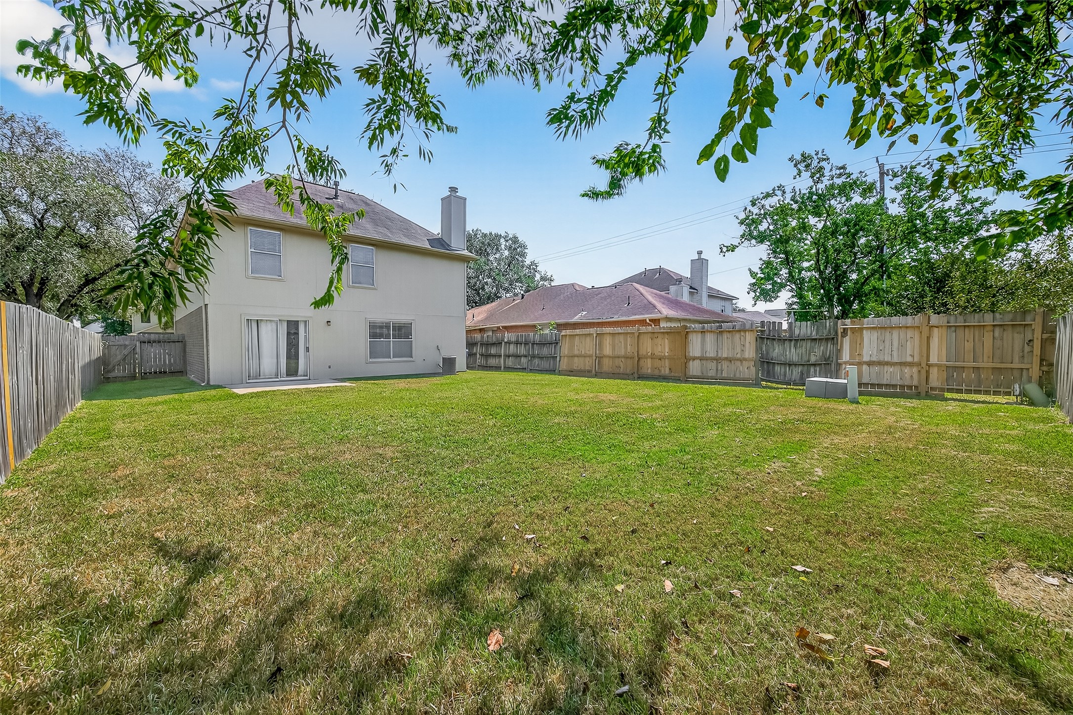 1107 Pennygent Lane Channelview, TX 77530 - Photo 36 of 40 a view of a house with a yard