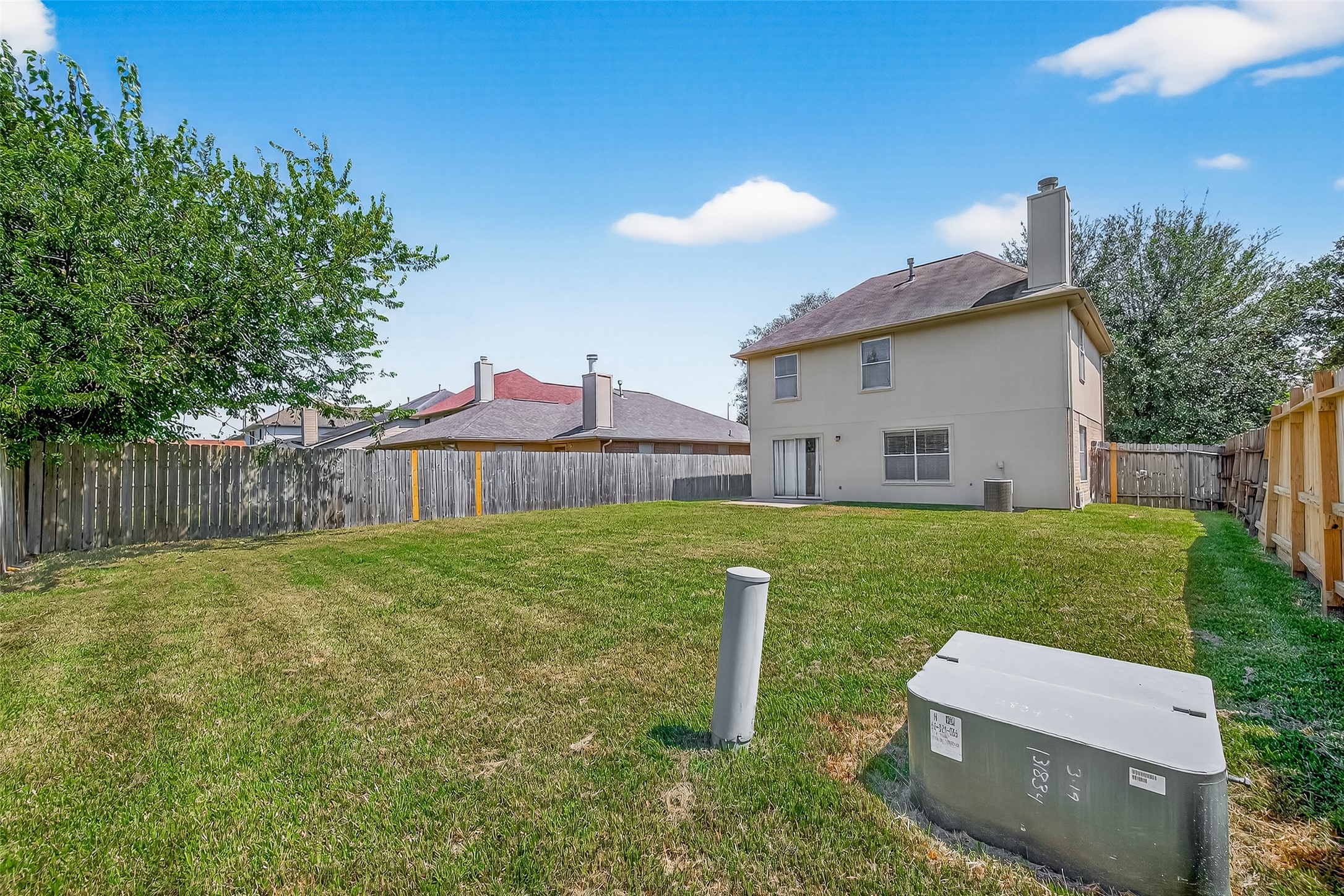 1107 Pennygent Lane Channelview, TX 77530 - Photo 38 of 40 a view of a house with backyard and garden