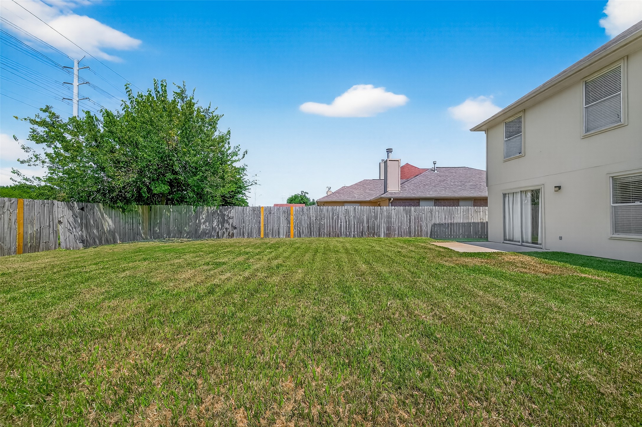 1107 Pennygent Lane Channelview, TX 77530 - Photo 39 of 40 a view of a backyard with a garden