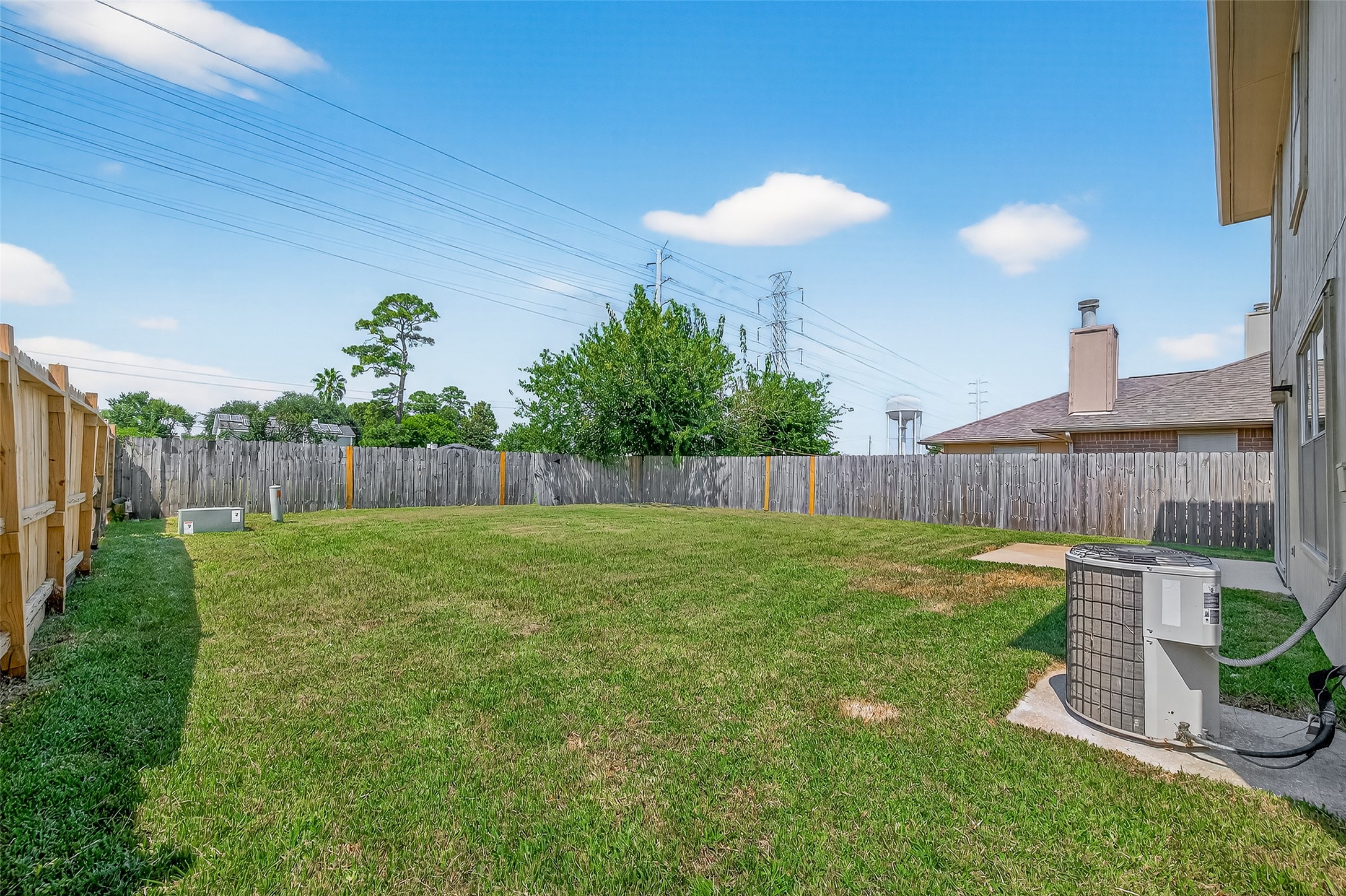 1107 Pennygent Lane Channelview, TX 77530 - Photo 40 of 40 a view of a backyard with a slide