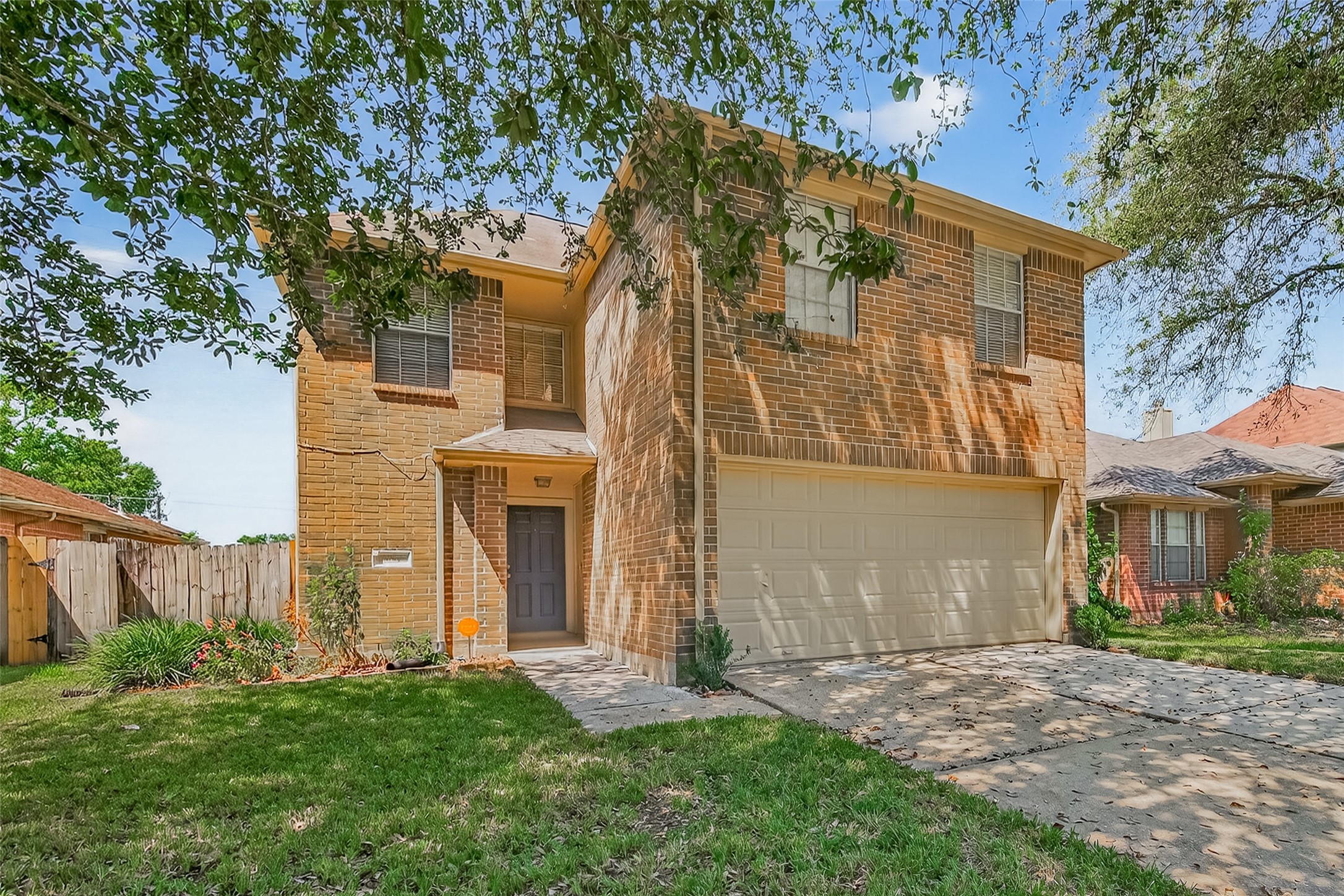 1107 Pennygent Lane Channelview, TX 77530 - Photo 4 of 40 a view of a big house with a big yard and large tree