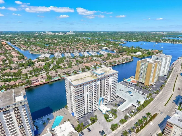 a view of city with ocean