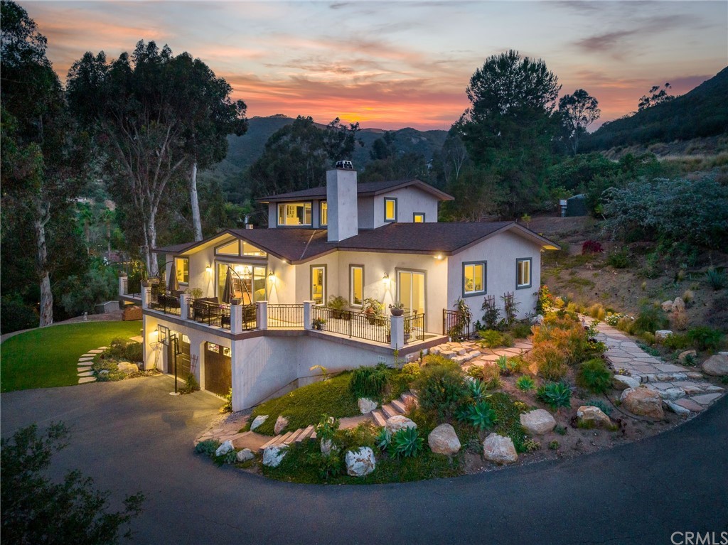 9519 Mt Israel Road Escondido, CA 92029 - Photo 1 of 1 a front view of a house with a yard street and trees