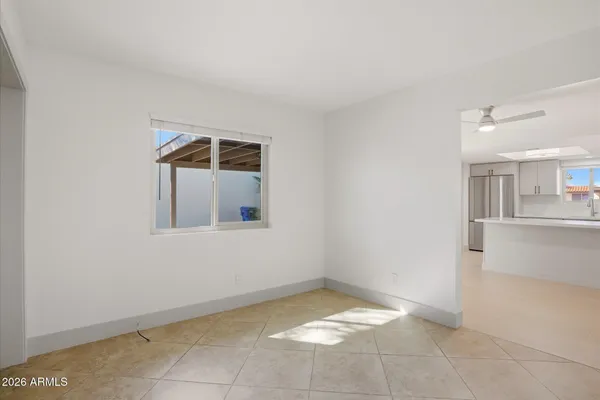 a view of an empty room and window