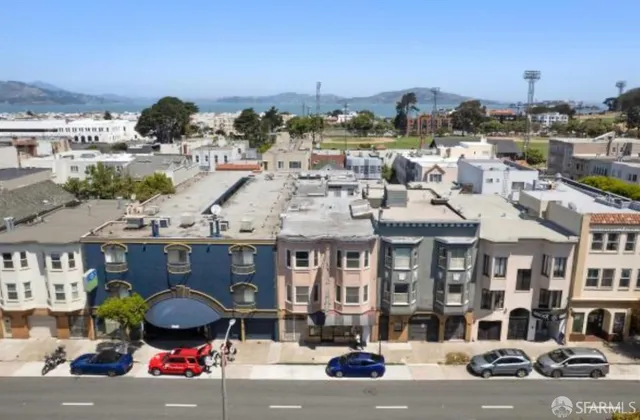 a front view of a building with street view