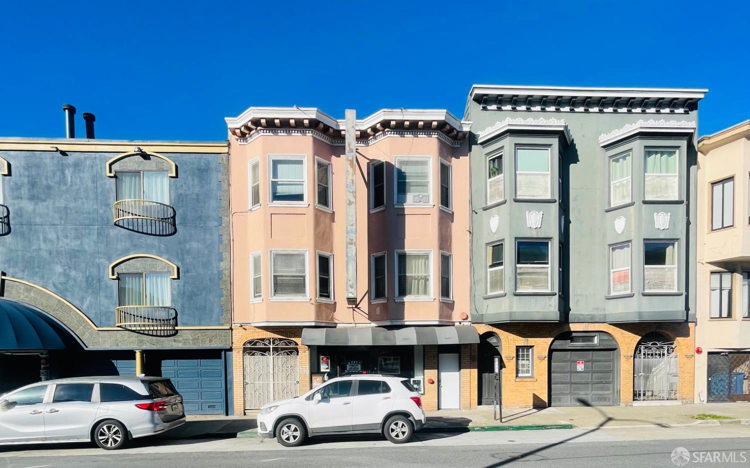 1926-1930 Lombard Street San Francisco, CA 94123 - Photo 11 of 26 a car parked in front of a building