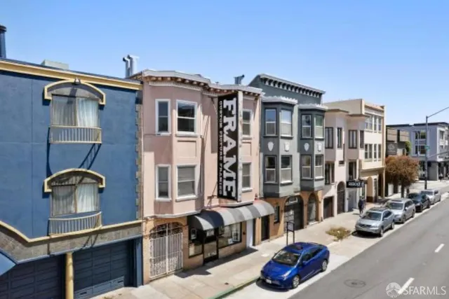 a front view of a building with glass windows