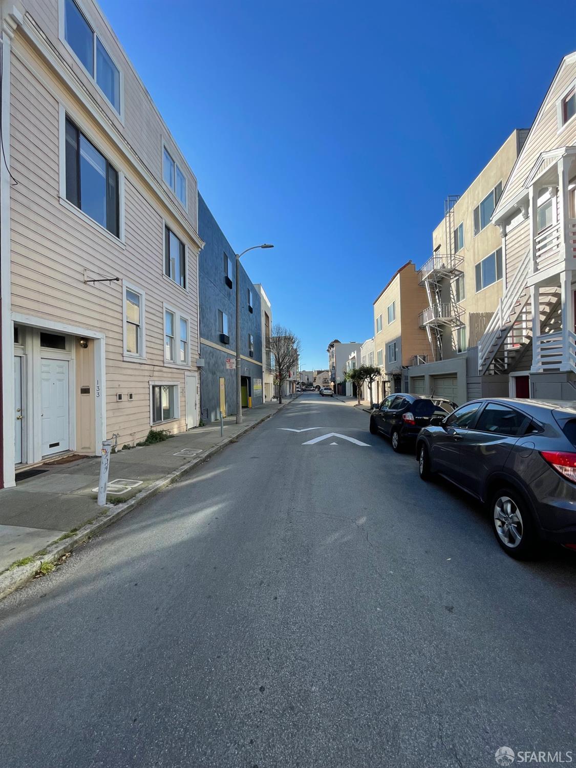 1926-1930 Lombard Street San Francisco, CA 94123 - Photo 17 of 26 a car parked in front of a building
