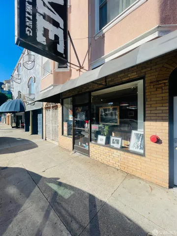 a view of a building with sitting area