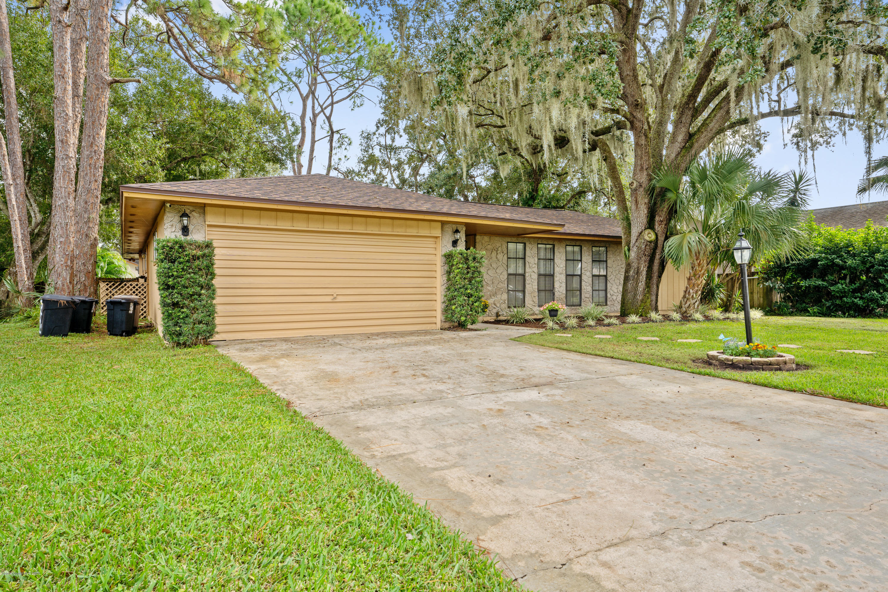 1540 Van Eck Road Northeast Palm Bay, FL 32907 - Photo 2 of 29 2 Side Front View