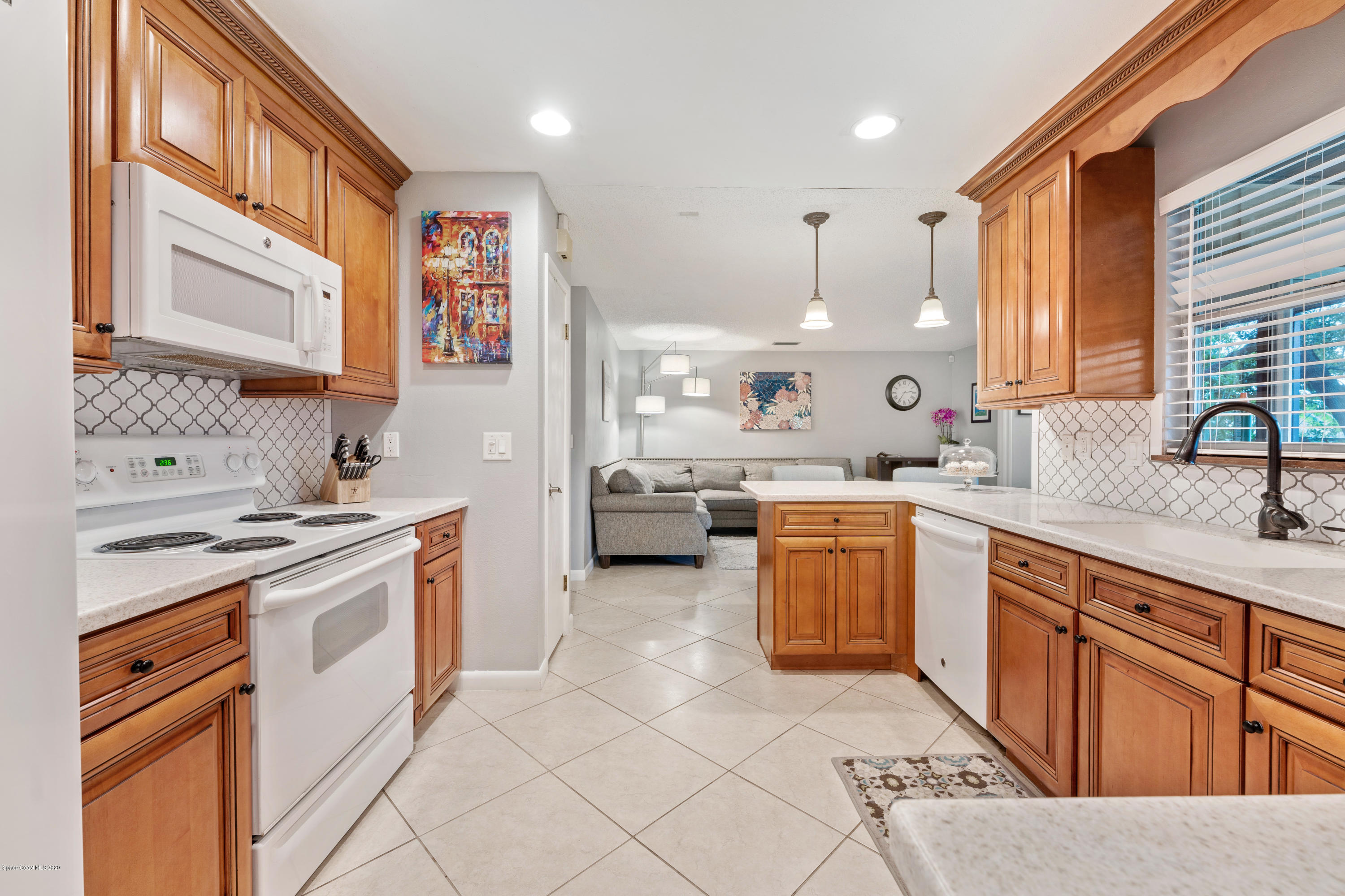1540 Van Eck Road Northeast Palm Bay, FL 32907 - Photo 9 of 29 7 kitchen family room view