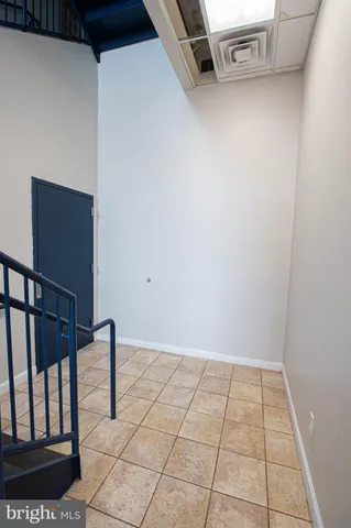 a view of a livingroom with an empty space and window