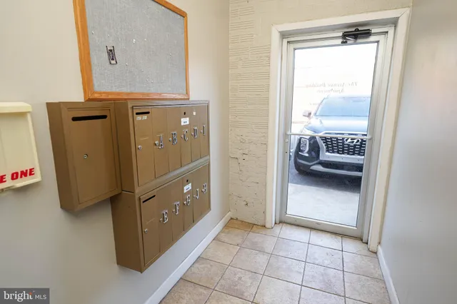 a view of a bedroom with a wardrobe