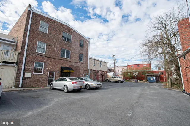 a car parked in front of a building