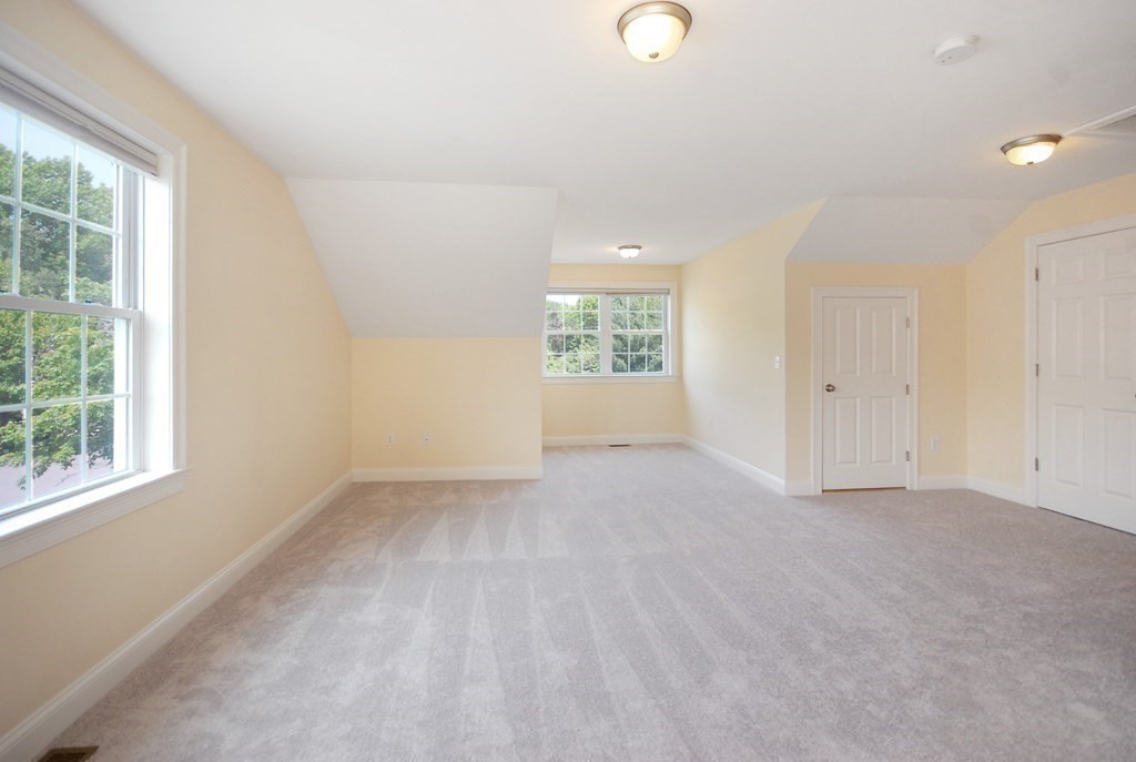 17 Marble Farm Road, Unit 17 Maynard, MA 01754 - Photo 18 of 26 an empty room with windows