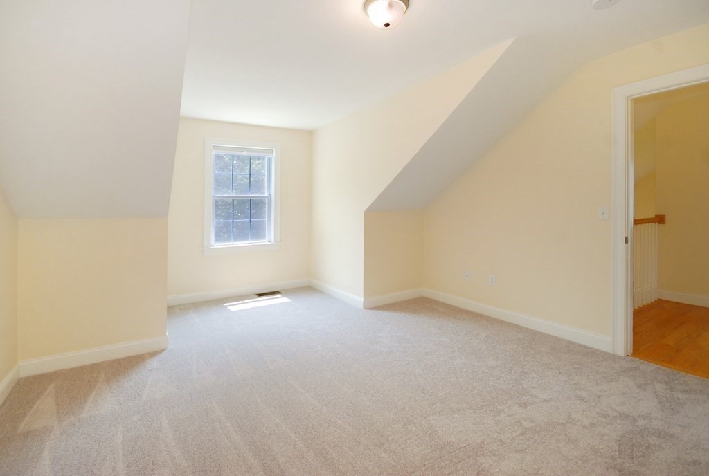 17 Marble Farm Road, Unit 17 Maynard, MA 01754 - Photo 20 of 26 an empty room with windows