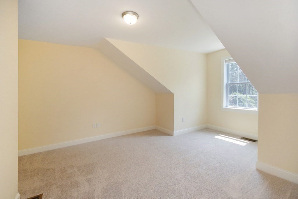 17 Marble Farm Road, Unit 17 Maynard, MA 01754 - Photo 21 of 26 an empty room with windows