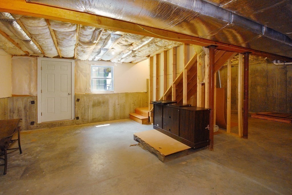 17 Marble Farm Road, Unit 17 Maynard, MA 01754 - Photo 22 of 26 a view of a room with wooden walls