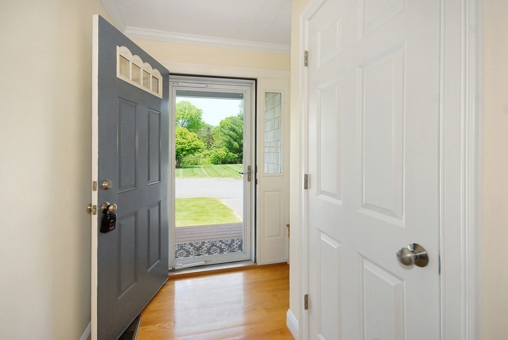 17 Marble Farm Road, Unit 17 Maynard, MA 01754 - Photo 3 of 26 a view of a bathroom with a window and wooden floor