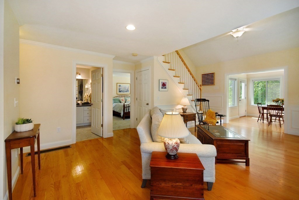 17 Marble Farm Road, Unit 17 Maynard, MA 01754 - Photo 10 of 26 a living room with furniture and a table