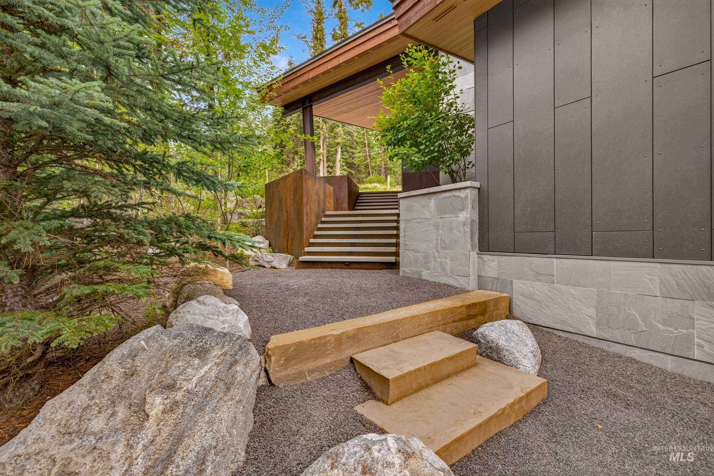 1882 A Warren Wagon Road McCall, ID 83638 - Photo 44 of 49 Low maintenance Swiss Pearl concrete panel siding.