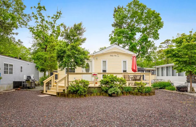 a house view with a garden space